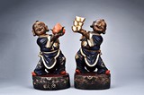 A PAIR OF PAINTED WOOD CARVED CHILDREN