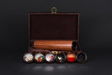 A SET OF WOOD KALEIDOSCOPE WITH LENS