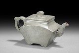 A ZISHA STONEWARE WITH TIN TEAPOT