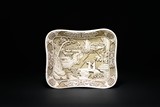 A CARVED RECTANGULAR DISH