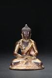 A PARCEL-GILT STATUE OF AMITABHA
