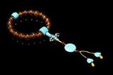 AN AMBER AND TURQUOISE ROSARY BRACELET