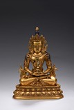 A GILT-BRONZE FIGURE OF AMITABHA