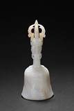 A WHITE JADE CARVED BUDDHIST RITUAL BELL