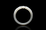 A WHITE JADE CARVED 'DRAGON' BANGLE