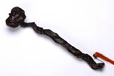 AN AGARWOOD CARVED RUYI SCEPTER 