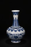 A MING-STYLE BLUE AND WHITE BOTTLE VASE