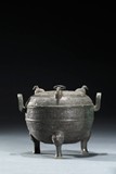 A BRONZE RITUAL TRIPOD DING CENSER