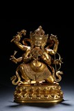 A GILT-BRONZE FIGURE OF TIBETAN MAHAKALA