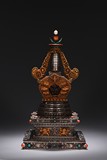 A SILVER AND GILT-BRONZE BUDDHIST PAGODA