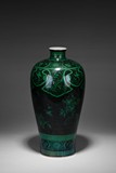 A BACKGROUND GREEN ENAMELED 'POMEGRANATE VASE