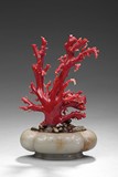 A WHITE JADE PLANTER WITH AKA RED CORAL
