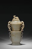 A WHITE JADE 'DRAGON' VASE AND COVER