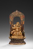 A GILT BRONZE JAMBHALA WITH CLOISONNE ENAMEL STAND 