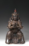 A LARGE PARCEL-GILT BRONZE CAST WEITUO STATUE 