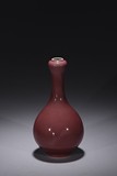 A RED GLAZED GARLIC-MOUTH VASE