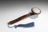 A WHITE JADE EMBELLISHED HARDWOOD RUYI SCEPTER