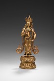 A STANDING GILT-BRONZE BODHISATTVA