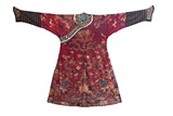 AN EMBROIDERED RED SILK DRAGON ROBE 