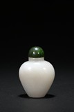 A WHITE JADE 'ORCHID' SNUFF BOTTLE