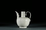A DING-TYPE FLOWER CARVED EWER