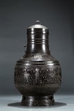 A BRONZE ‘TAOTIE’ HU VASE WITH COVER