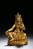 A GILT-BRONZE STATUE OF TARA