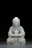 A WHITE JADE CARVED FIGURE OF AMITAYUS