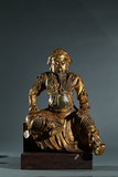 A GILT-BRONZE FIGURE OF GUANDI