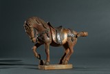 A STONE CARVED GILT SILVER INLAID HORSE