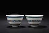 A PAIR OF DOUCAI 'FLORAL SCROLLING' WINE CUPS