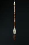 A WHITE JADE GILT-PAINTED BRUSH 