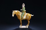 A SANCAI-GLAZED FIGURE ON HORSEBACK