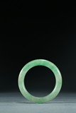 A TRANSLUCENT JADEITE BANGLE