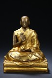 A GILT-BRONZE FIGURE OF THE SECOND PANCHEN LAMA