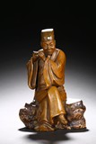 A SHIWAN CERAMIC FIGURE OF LV DONGBIN