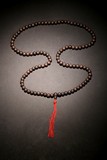 AN AGARWOOD BEAD NECKLACE