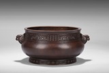 A LARGE BRONZE CENSER WITH TWO BEAST HANDLES