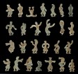 TWO SETS OF ARCHAIC JADE DANCING FIGURES