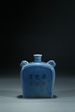 A GILT-DECORATED BLUE GLAZED JAR