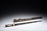 A MONGOLIAN SILVER AND GEMS INLAID SWORD 