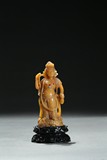 A SHOUSHAN CARVED GEM-INLAID BODHISATTVA