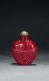 A RED GLASS SNUFF BOTTLE