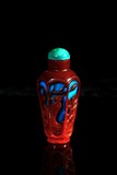 A PEKING RED OVERLAY BLUE GLASS SNUFF BOTTLE