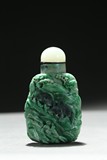 AN JADEITE CARVED 'BUFFALO' SNUFF BOTTLE