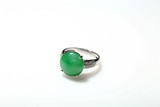 AN UNIQUE JADEITE ROUND CABOCHON DIAMOND RING