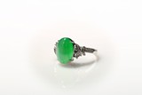 AN ICY APPLE GREEN JADEITE DIAMOND RING