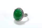AN ICY INTENSE GREEN JADEITE RING