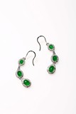 AN INTENSE EMERALD GREEN JADEITE JADE AND DIAMOND EARRING