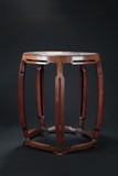 A LARGE AND RARE HUANGHUALI BARREL-FORM STAND